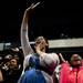 Robyn Stephens and Cianna Singleten with other family members cheer on Jayla Sims and her sister Janae during Skyline High School Commencement on Monday, June 10. Daniel Brenner I AnnArbor.com